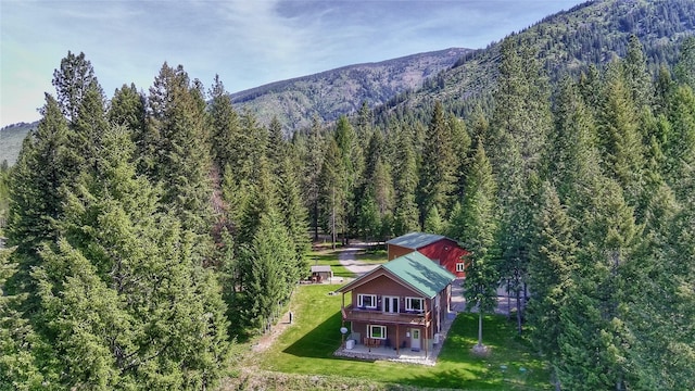 26 Castele Ln, Trout Creek, MT 59874 - view of mountain background with a heavily wooded area