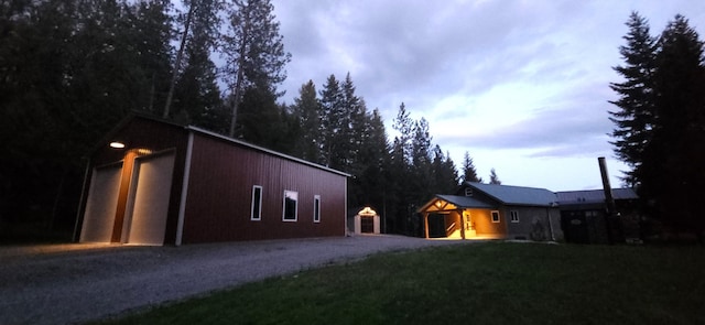 26 Castele Ln, Trout Creek, MT 59874 - view of side of home featuring a lawn