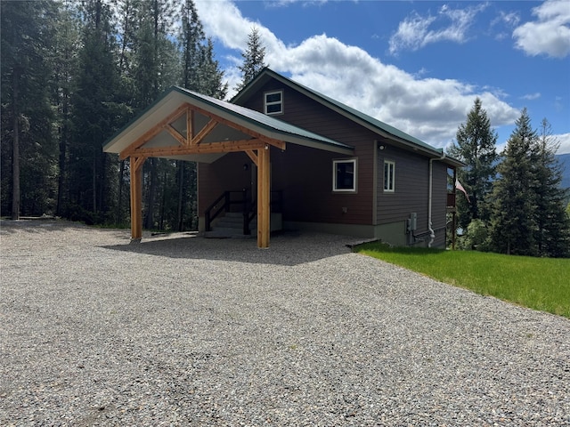 26 Castele Ln, Trout Creek, MT 59874 - view of side of property with a carport