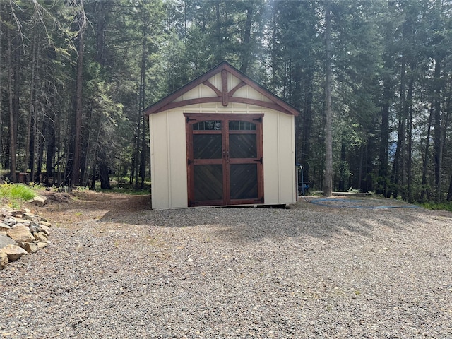 26 Castele Ln, Trout Creek, MT 59874 - view of shed with a view of trees