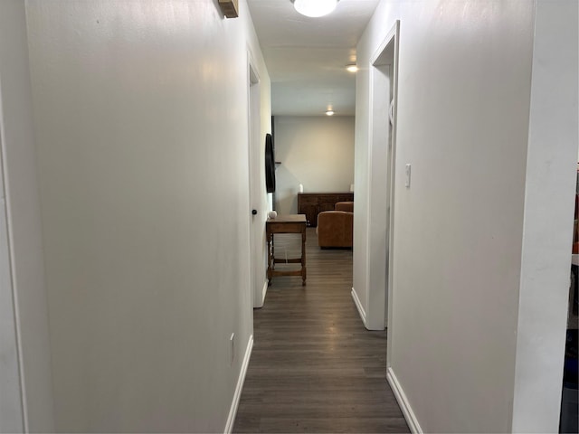 3410 Parkway St, Butte, MT 59701 - corridor featuring dark wood-style floors and baseboards