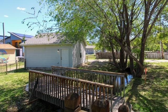 1310 Linnea Ln, Missoula, MT 59801 - wooden terrace with a fenced backyard