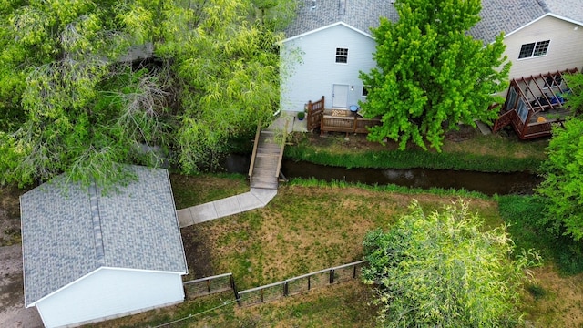 view of yard featuring fence and a wooden deck