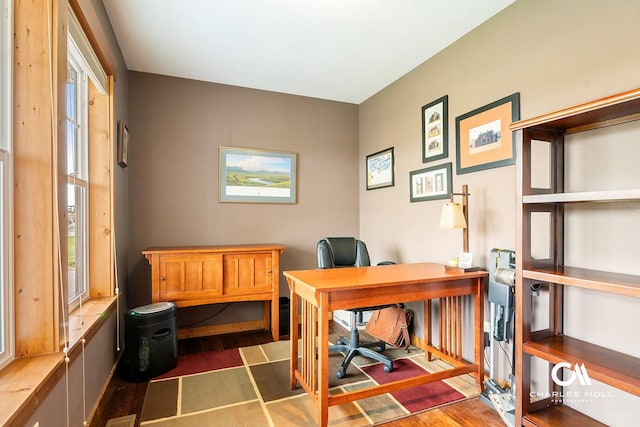 office area featuring dark wood-type flooring