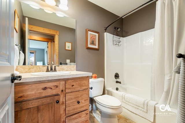bathroom with toilet, shower / tub combo, and vanity