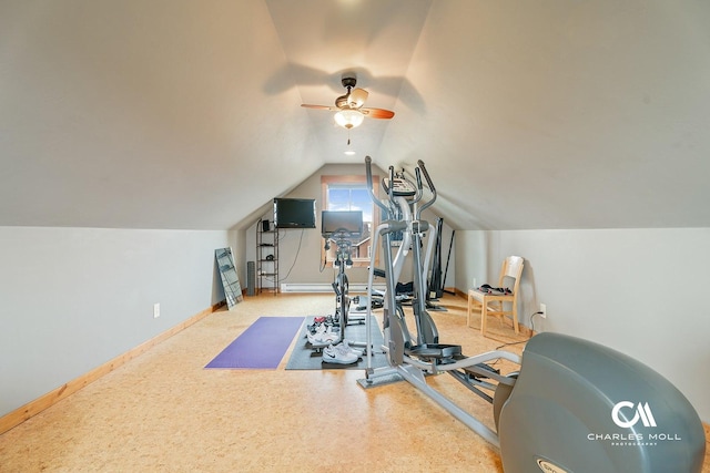 exercise area with a ceiling fan, vaulted ceiling, and baseboards