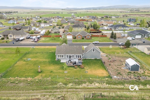 aerial view of residential area with a mountain backdrop