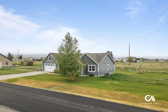view of front of home featuring concrete driveway