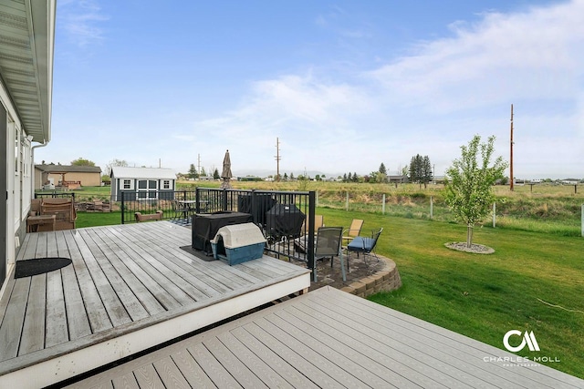 deck featuring a lawn