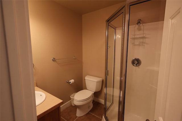 260 Eagle Bend Dr, Bigfork, MT 59911 - bathroom featuring a shower stall, vanity, and tile patterned floors