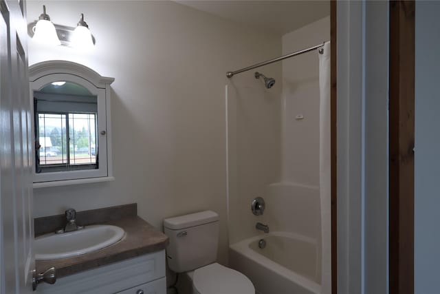 1515 11th St W, Columbia Falls, MT 59912 - full bathroom with vanity, toilet, and shower / tub combination