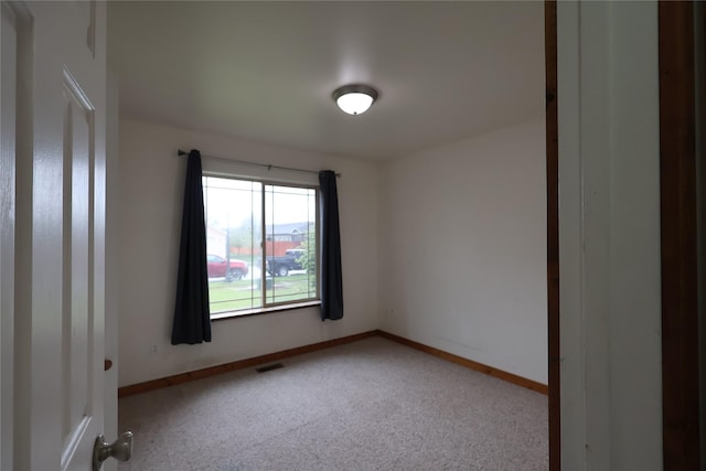 1515 11th St W, Columbia Falls, MT 59912 - unfurnished room with carpet flooring and baseboards