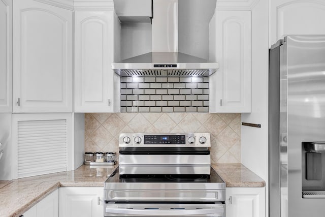 2965 Terrace Dr, Missoula, MT 59803 - kitchen with appliances with stainless steel finishes, wall chimney exhaust hood, and white cabinets