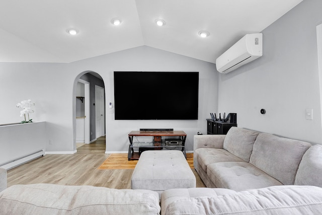 2965 Terrace Dr, Missoula, MT 59803 - living room featuring a wall mounted air conditioner, a baseboard heating unit, vaulted ceiling, arched walkways, and wood finished floors