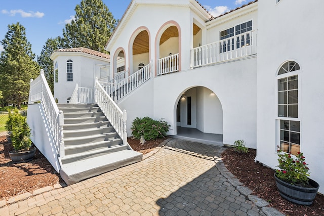 2965 Terrace Dr, Missoula, MT 59803 - view of front of home featuring stucco siding and stairs
