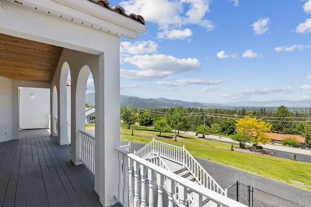 2965 Terrace Dr, Missoula, MT 59803 - deck featuring a porch, a mountain view, and a yard