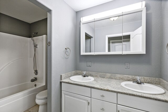 2965 Terrace Dr, Missoula, MT 59803 - full bathroom with double vanity, toilet, and washtub / shower combination
