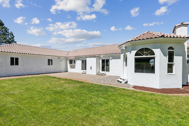 2965 Terrace Dr, Missoula, MT 59803 - rear view of property featuring a tile roof, a lawn, and stucco siding