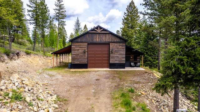 25 Hodge Rdg, Kila, MT 59920 - view of outdoor structure with dirt driveway