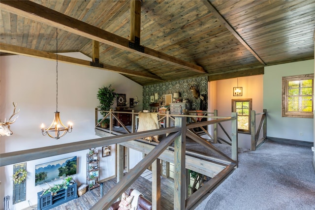 25 Hodge Rdg, Kila, MT 59920 - living area with a chandelier, wood ceiling, carpet flooring, and baseboards