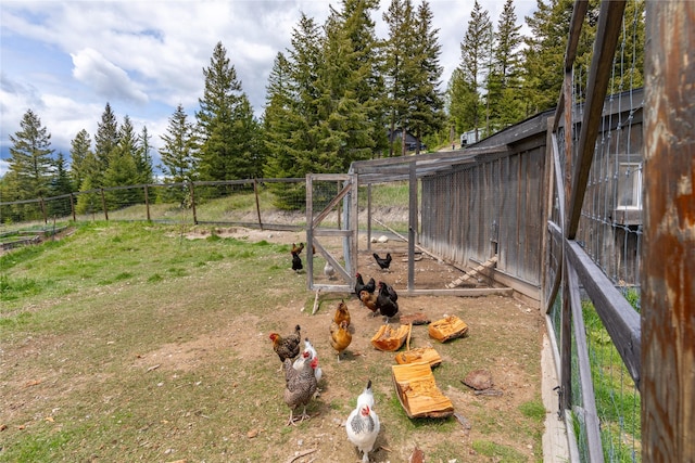 25 Hodge Rdg, Kila, MT 59920 - view of yard featuring exterior structure and an outbuilding