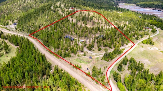 25 Hodge Rdg, Kila, MT 59920 - aerial view of property and surrounding area with property boundaries highlighted and a forest