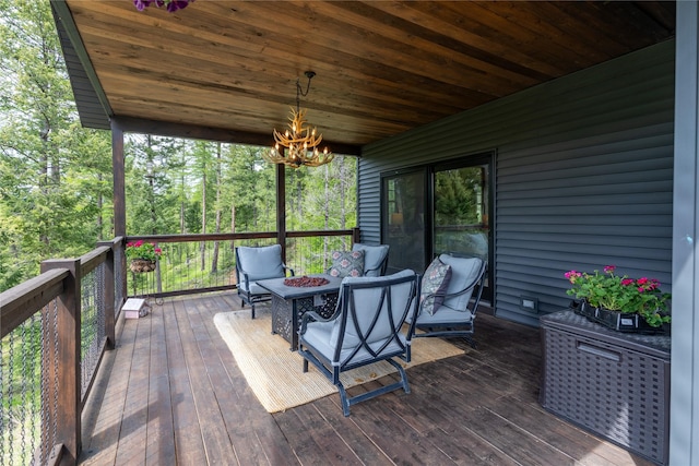25 Hodge Rdg, Kila, MT 59920 - wooden terrace featuring an outdoor fire pit