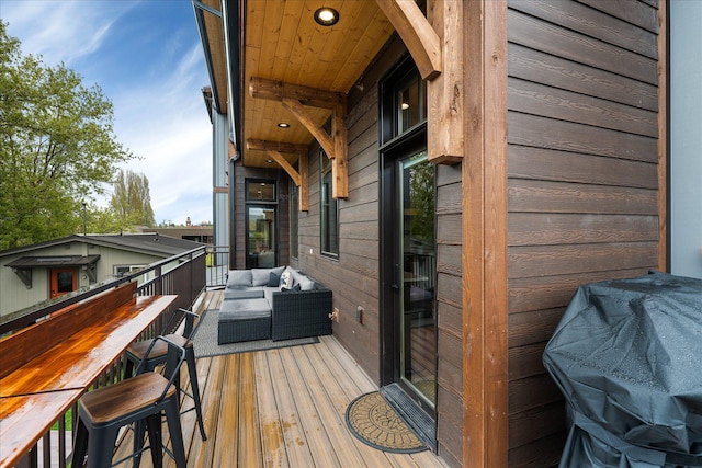 deck featuring an outdoor living space