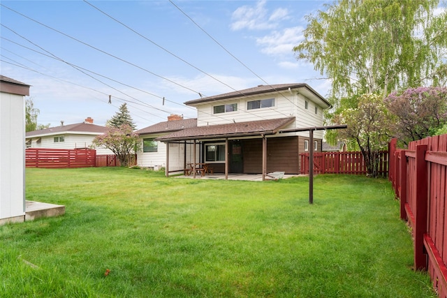 back of property with a patio