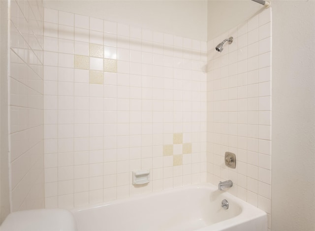 bathroom with shower / tub combination