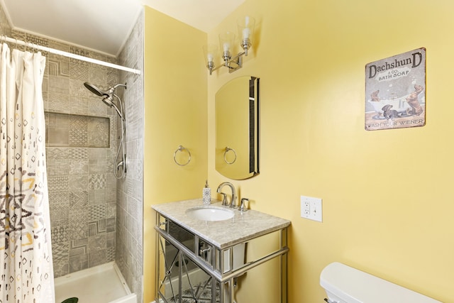 full bath with a shower stall, toilet, and vanity