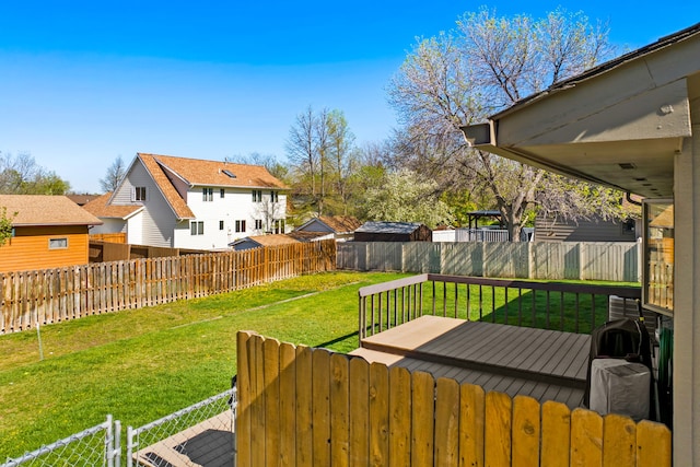 wooden deck with a residential view