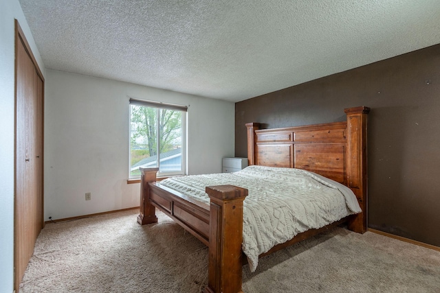 4 Rocky Mountain Dr, Whitehall, MT 59759 - carpeted bedroom featuring baseboards and a textured ceiling