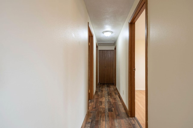 4 Rocky Mountain Dr, Whitehall, MT 59759 - corridor featuring hardwood / wood-style flooring and a textured ceiling