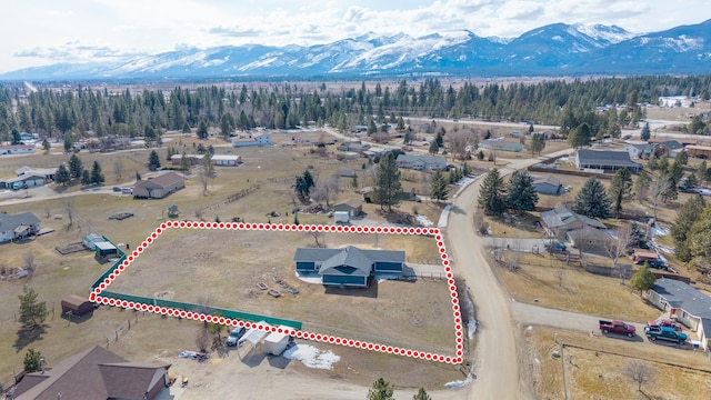 135 Meadow Ln, Victor, MT 59875 - aerial view of property's location featuring a mountainous background and property parcel outlined