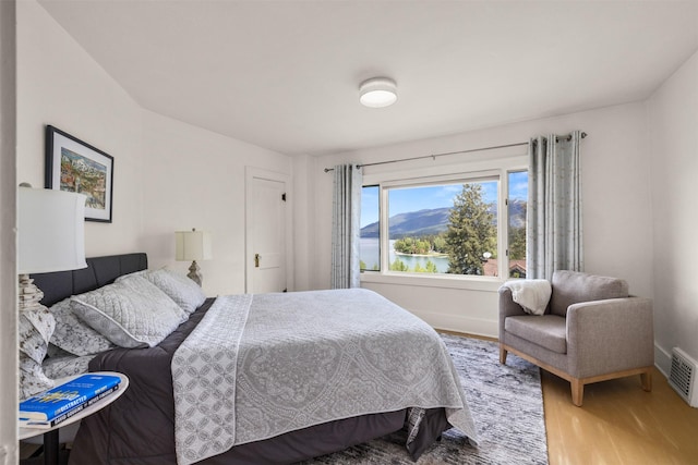 211 Idaho Ave, Whitefish, MT 59937 - bedroom with wood finished floors and baseboards