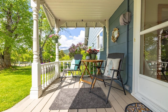 211 Idaho Ave, Whitefish, MT 59937 - deck with a porch and a lawn