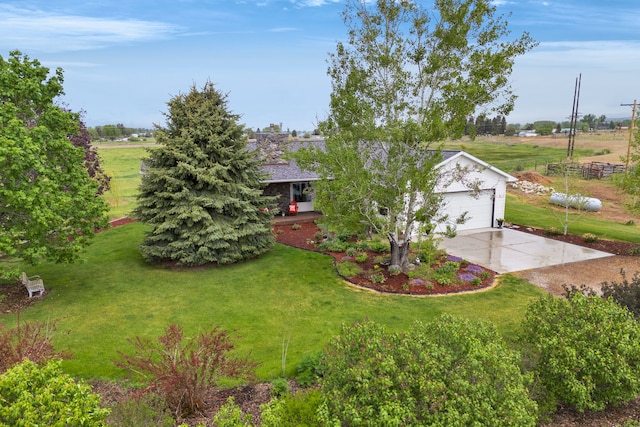 551 Fox Meadow Ln, Hamilton, MT 59840 - view of grassy yard with driveway and a garage