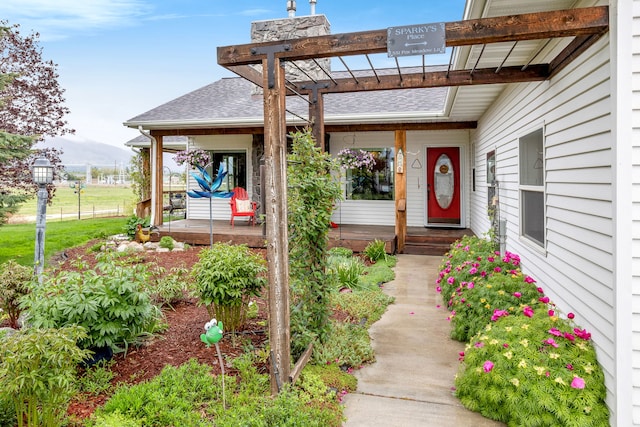 551 Fox Meadow Ln, Hamilton, MT 59840 - entrance to property featuring roof with shingles and a mountain view