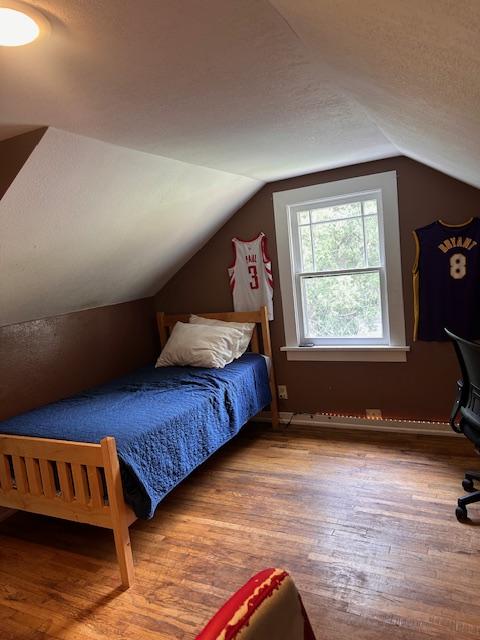 339 E Beckwith Ave, Missoula, MT 59801 - bedroom with wood finished floors and lofted ceiling