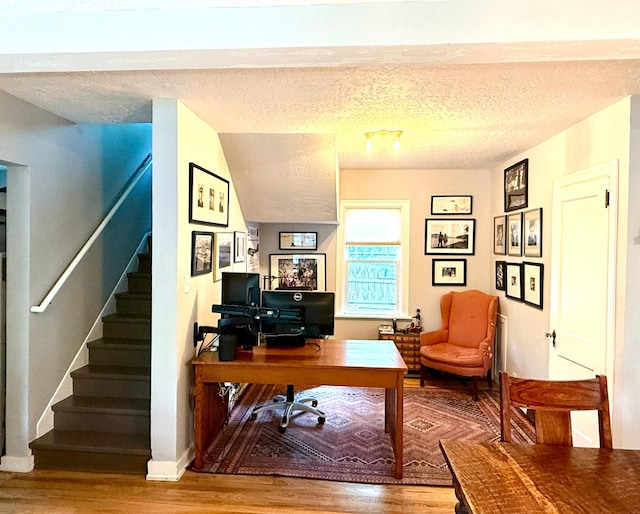 339 E Beckwith Ave, Missoula, MT 59801 - office area featuring wood finished floors, a textured ceiling, and baseboards