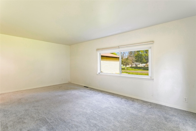 10225 Shady Ln, Bonner, MT 59823 - carpeted empty room with baseboards