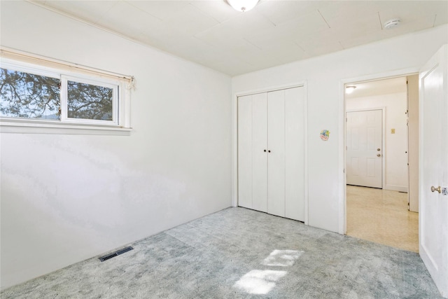10225 Shady Ln, Bonner, MT 59823 - unfurnished bedroom with carpet flooring and a closet