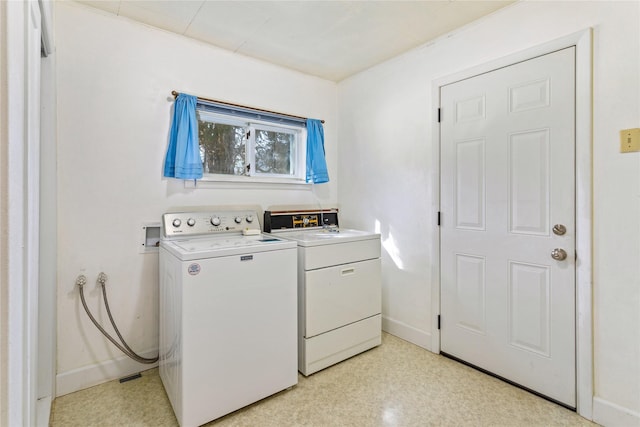 10225 Shady Ln, Bonner, MT 59823 - laundry room featuring independent washer and dryer and baseboards