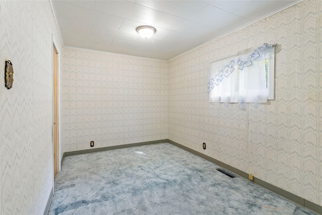 10225 Shady Ln, Bonner, MT 59823 - carpeted empty room with ornamental molding, wallpapered walls, and baseboards