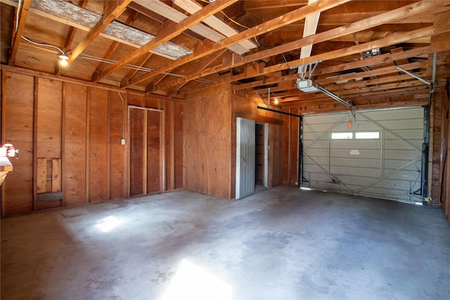 10225 Shady Ln, Bonner, MT 59823 - garage featuring a garage door opener
