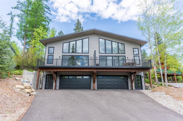 968 Colorado Ave Unit A, Whitefish, MT 59937 - view of front facade featuring driveway and a garage