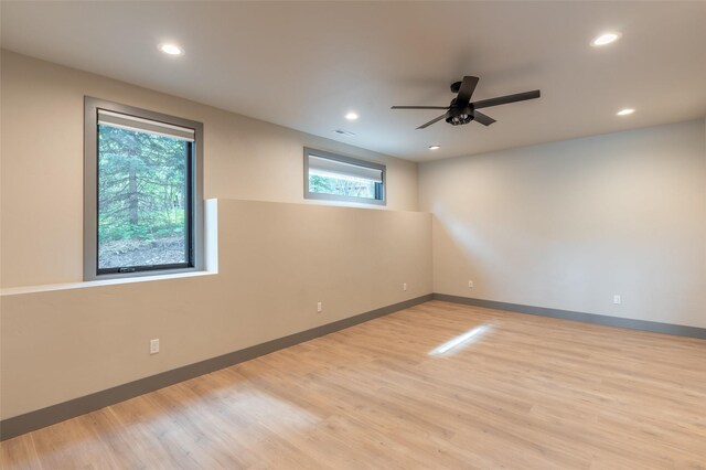 968 Colorado Ave Unit A, Whitefish, MT 59937 - unfurnished room featuring wood finished floors, a ceiling fan, recessed lighting, and baseboards