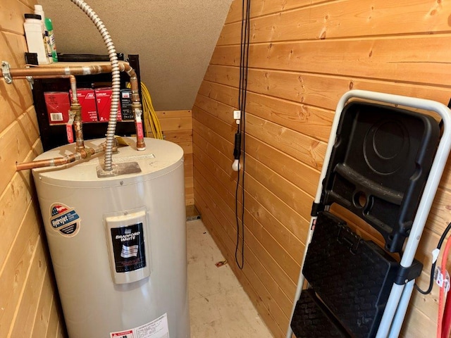 utility room featuring electric water heater