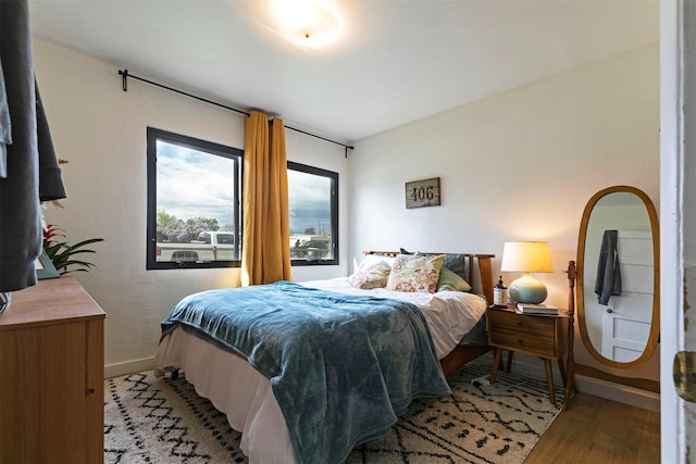2112 W Central Ave, Missoula, MT 59801 - bedroom featuring light wood-type flooring and baseboards